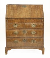 Lot 568 - A strung and crossbanded walnut bureau