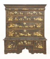 Lot 575 - A black lacquered chest on stand