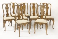 Lot 653 - A set of ten walnut and marquetry inlaid dining chairs