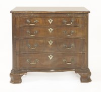 Lot 654 - A George III mahogany serpentine front chest