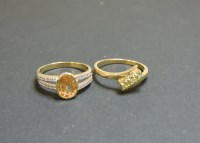 Lot 105 - A 9ct gold single stone garnet ring