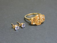 Lot 107 - A 9ct gold topaz cluster ring