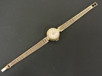 Lot 111 - A ladies 9ct gold Record mechanical bracelet watch