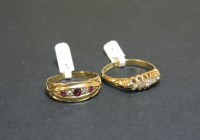 Lot 50 - An 18ct gold ruby and diamond ring