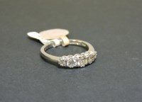 Lot 51 - An 18ct white gold graduated five stone diamond ring