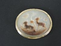 Lot 24 - A carved mother of pearl shell cameo brooch