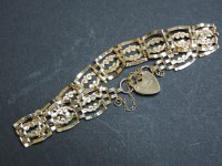 Lot 38 - A 9ct gold four row crimped link gate bracelet