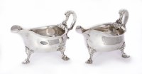 Lot 73 - A pair of large silver sauce boats