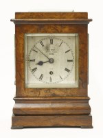 Lot 417 - A walnut library timepiece