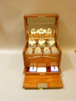 Lot 452 - A late 19th century decanter compendium