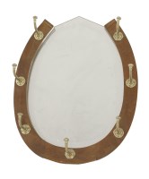 Lot 651 - A Victorian oak horseshoe shaped wall-mounted mirror and hat rack