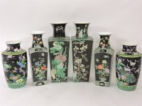 Lot 401 - A pair of 20th century famille noir vases