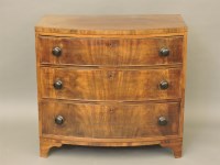 Lot 566 - A small Victorian mahogany bow front chest