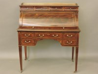 Lot 585 - An Edwardian inlaid mahogany cylinder desk