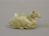 Lot 103 - A Chinese jade brush rest