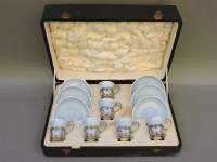 Lot 489 - An Aynsley demi tasse coffee set