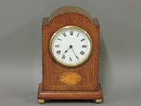 Lot 285 - An Edwardian inlaid mantel clock