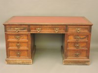 Lot 662 - A Maple and Co twin pedestal mahogany desk