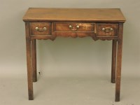 Lot 594 - A George III mahogany side table