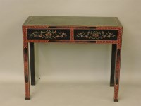 Lot 690 - A lacquered side table