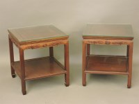 Lot 721 - A pair of Chinese hardwood side tables