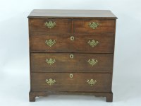 Lot 674 - An early 19th century oak chest of drawers