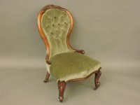 Lot 600 - A Victorian walnut spoon back chair