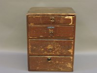 Lot 390 - A pine four drawer chest