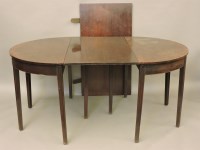 Lot 608 - A George III mahogany dining table