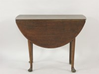 Lot 645 - A George II mahogany pad foot table