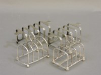 Lot 155 - A pair of silver toast racks