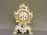 Lot 281 - A French porcelain mantel clock