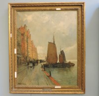 Lot 561 - F Stuermann
VIEW OF A QUAYSIDE WITH FIGURES AND BOATS
Signed l.l.