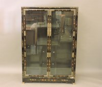 Lot 693 - A modern Chinese lacquered display cabinet