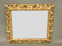 Lot 573 - A 19th century Italian carved and gilded wood mirror