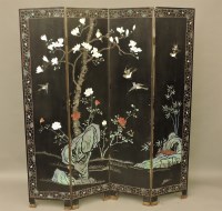 Lot 691 - A Chinese lacquered four fold screen