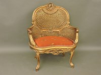 Lot 752 - A French gilt bergère fauteuil