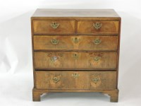 Lot 574 - A 19th century mahogany chest of two short and three long drawers