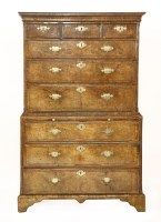 Lot 633 - A walnut chest on chest