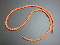 Lot 91 - A single row graduated coral bead necklace