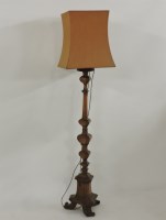 Lot 669 - A modern walnut standard lamp and shade