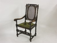 Lot 641 - A 17th century walnut cane seated armchair