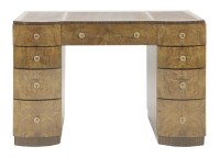 Lot 221 - An Art Deco macassar and walnut pedestal desk