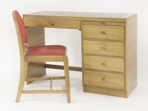 Lot 228 - An Art Deco light walnut desk
