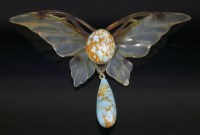 Lot 3 - An Art Nouveau carved and stained horn butterfly pendant