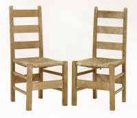Lot 41 - A pair of limed oak Letchworth chairs