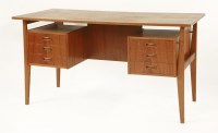 Lot 536 - A Danish teak desk