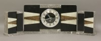 Lot 252 - An Art Deco marble and onyx clock garniture