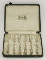 Lot 74 - A set of six silver Liberty & Co. cake forks