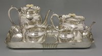 Lot 85 - A silver-plated four-piece teaset